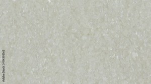 White sugar rotate. White sugar clockwise rotation . Close up
