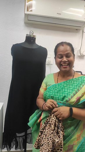 Sleeve less top with over coat 900 only | Lewa Designers