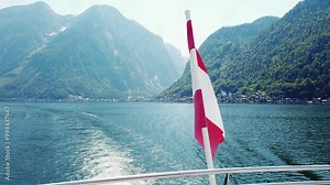 National flag of Austria flapping on cruise ship. Austrian flag waving on wind