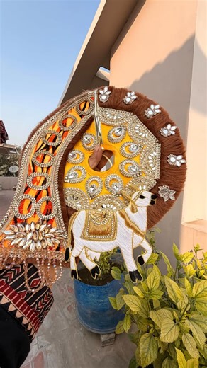 Pitari by Priya | Poshak Store on Instagram: "🕉️ Mahadev Theme Poshak Inspired by the divine aura of Mahadev, this poshak beautifully features Nandi Maharaj, symbol of faith and devotion 🤍 The saffron and golden base with heavy stone, kundan, and mirror work gives a powerful yet peaceful spiritual vibe ✨ Temple-style detailing and rich handwork make it perfect for Shivratri or Mahadev shringar. Har Har Mahadev 🙏"