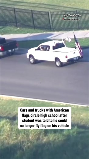 After a high school in #Oklahoma told a student he couldn't fly his American flag on his vehicle on campus, he called on people for support. And he recieved it in a big way as cars and trucks circled around the school with flags flying high.