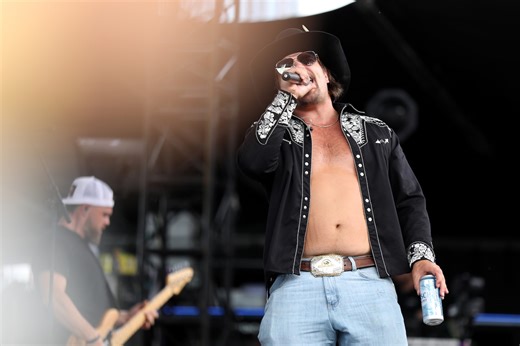 Country music star made $150,000 selling shirts with his mugshot after arrest