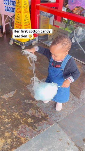 Her first cotton candy reaction