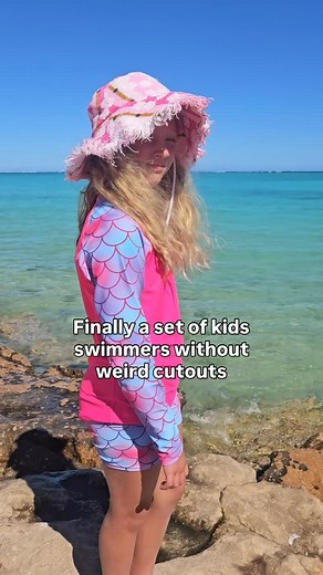 1.2K views | Cutout swimmers on kids make about as much sense as white school socks at the beach 浪 Give me rashies and shorts any day! Our new matching rashies + shorts keep them sun-safe (UPF50+) and comfy for all-day fun in the water.  in bio to grab yours! It’s available in two prints - Mermaid and Neon Dream ✅ Follow for more smart parenting hacks | Schmik Swim Parkas | Facebook