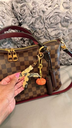 “Falling” for these cute charms on my Louis Vuitton Lymington bag! #luxurybags #louisvuitton #charms