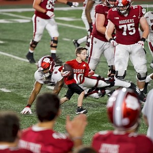 120K views · 1.7K reactions | Team Impact teammate Drew Shouse seals the victory for crimson!  | Indiana Football | Facebook