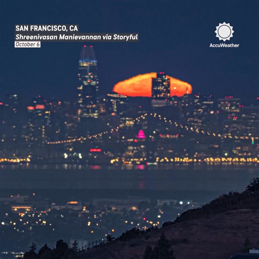 A glowing near-supermoon dipped behind the San Francisco skyline, lighting up the morning sky in shades of orange 🌕✨ | AccuWeather