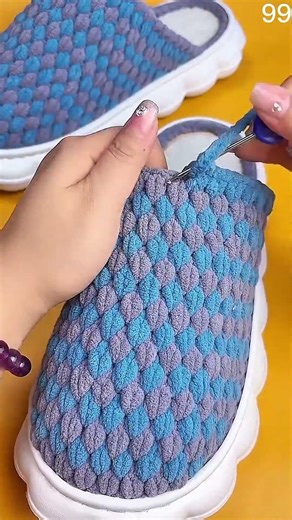 Hand adjusts woven slipper strap, cushioned sole