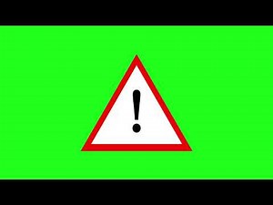 Attention sign icon with chroma key animation. Hazard Warning Triangle Green screen background