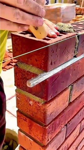 Building a Brick Wall with Skilled Masonry Technique
