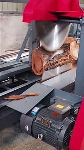 cutting a log using two chainsaws in the factory #automobile