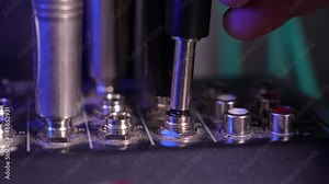 LED audio mixer, ideal for stock agencies, music production, live sound, and broadcast. Hand inserts jack microphone input jacks for universal connectivity.