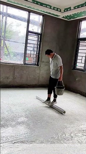 Concrete Smoothing Secret: Watch This Worker "Roll" Perfect Floors Like a Pro!