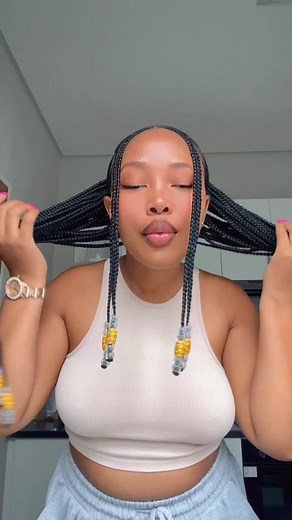 Tribal Braids with Beads - Stunning Hairstyles for 2024