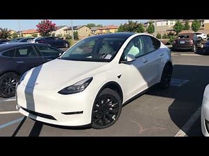 Tesla Model Y white or black interior ** Beautiful color Mix ** Black wheels and non covered wheels