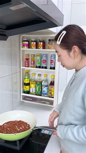 Choose a wall-mounted spice rack for your kitchen; it doesn't take up much space