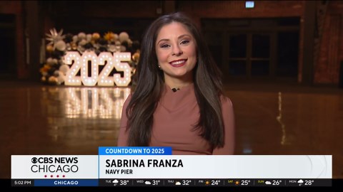 Chicago celebrating the New Year's Eve with fireworks at Navy Pier and along the Chicago River