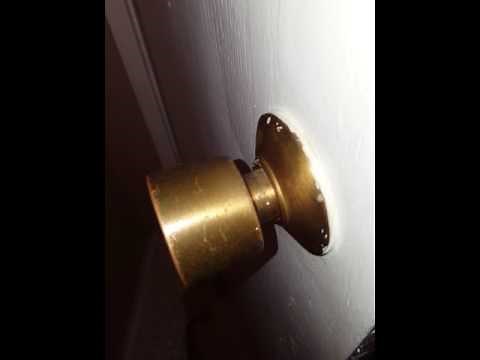 How to remove door knob without exposed screws!