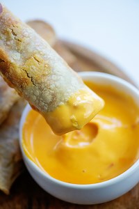 These cheesy air fryer taquitos are loaded with beef and perfect for dipping!