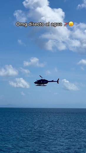 Helicopter Taking Off Over Water