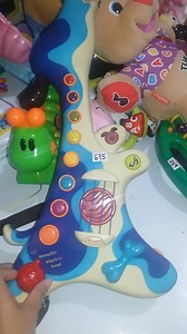 B. Toys B. Woofer Hound Dog Guitar : This kids' guitar toy has realistic strings, so your little one can strum to his heart's content. | YUMI's Onlineshoppe: U.S. Preloved Toys | Facebook