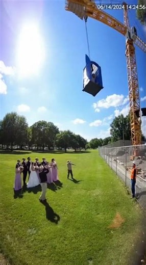 Construction Crane Accidentally Lifts Porta Potty With Person Inside During Wedding Photoshoot!