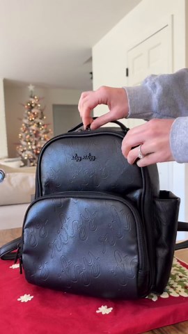 Itzy Ritzy Mini Diaper Bag Backpack – Chic, Compact Mini Plus Backpack with Changing Pad, 10 Pockets (6 Internal, 4 External), Grab-Top Handle & Rubber Feet (Chai)