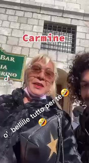 Carmine's Stylish Look in Urban Setting