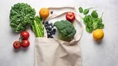 Stop motion animation of grocery shopping. Healthy vegetables and...