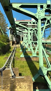 Schwebebahn Dresden one of oldest suspended railroads in world. Iron construction only. Suspension cable car, Dresden, Germany. Vertical footage.