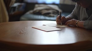 Woman writing a letter