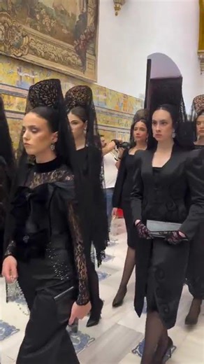 The mantilla is a traditional Spanish lace garment that women wear over the head and shoulders