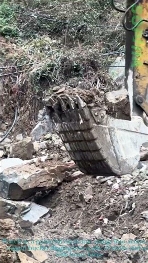 Excavator Loading Rocks:Heavy Duty Construction Action