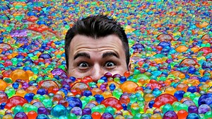 I filled a pool with 25 million waterballs (aka Orbeez) so I could settle an argument about how far you sink if you jump in. | Mark Rober