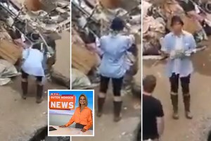 German TV reporter seen covering herself in mud before clean-up claims