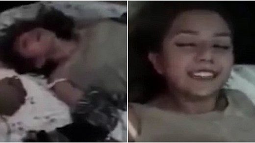 Chilling moment evil grin appears on 'possessed' girl's face