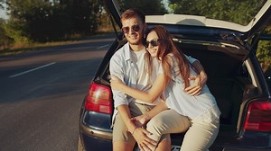 Happy couple enjoy romantic sunset in car - Free Stock Video