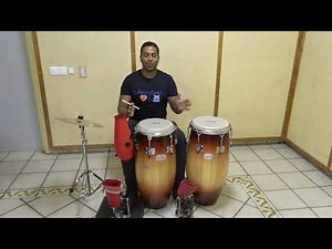 Percussion set. How to play Cuban son (salsa), congas, clave, guiro, and bell.