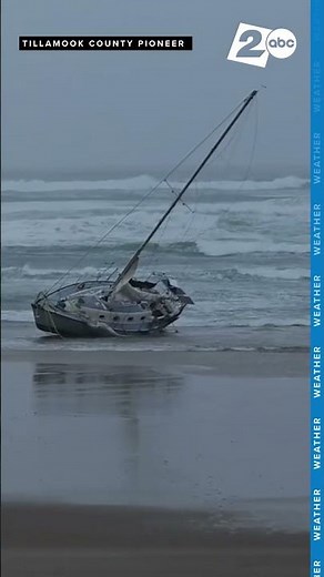 Abandoned sailboat washes ashore at Rockaway Beach as November storm sweeps Oregon coast