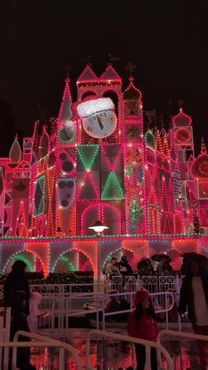 Small World clock (Glockenspiel) with a festive Santa Claus cap, delighted the holiday crowds. #love