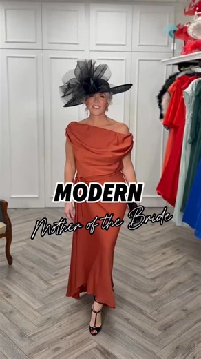 ✨ Modern Mother of the Bride | Statement Rust Elegance ✨ Meet the modern Mother of the Bride outfit that’s turning heads this season. Designed for stylish mums who want something different, this stunning rust-coloured occasion outfit combines contemporary elegance with ultra-flattering design. ✔️ Soft draped fabric to smooth and sculpt the tummy and bottom ✔️ Versatile neckline – wear on or off the shoulder for two modern looks in one ✔️ Rust tone – a standout wedding colour trend for 2026, warm