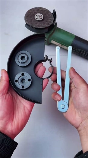 Angle grinder modified with pressure plate protective cover