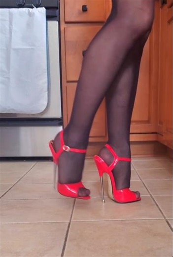 Red 6 inch high heels walking around