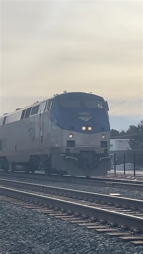 Amtrak P42DC #104 Leads Amtrak 63 By Colonie, NY With A Friendly Engineer!