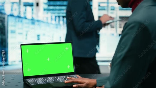Green screen laptop used by data center software developer using AR simulation to monitor systems. Server hub IT professional using chroma key notebook to do optimizations, VFX overlay, camera B