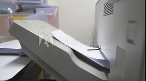 copier or printer machine with copy or xerox and white blank paper with people hand picked up paper on tray in work office and lot of work for print report and business document on slow motion Stock Video