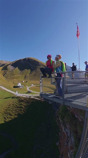 Adventure Couple Kisses before Base Jump