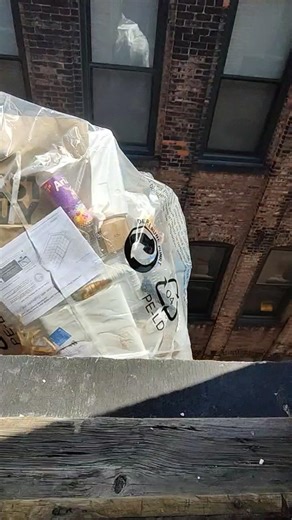 throw stuff out a fourth floor window. look out below! sometimes work is fun. good day son