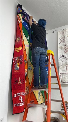 104K views · 547 reactions | We have finally found time and a spot to hang the original Flare Style T-shirt quilt. This is the quilt that started the Ultra Modern T-shirt Quilt Collection. #toocooltshirtquilts #tshirtquilt #quiltdesign #roygbiv #flare #behindthescenes | Too Cool T-Shirt Quilts | Facebook