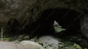 A hidden world of wonder and tranquility, the cave reveals the timeless beauty of nature's relentless erosion amidst the solid embrace of earth and rock, with the gentle melody of river, Rakov Škocjan